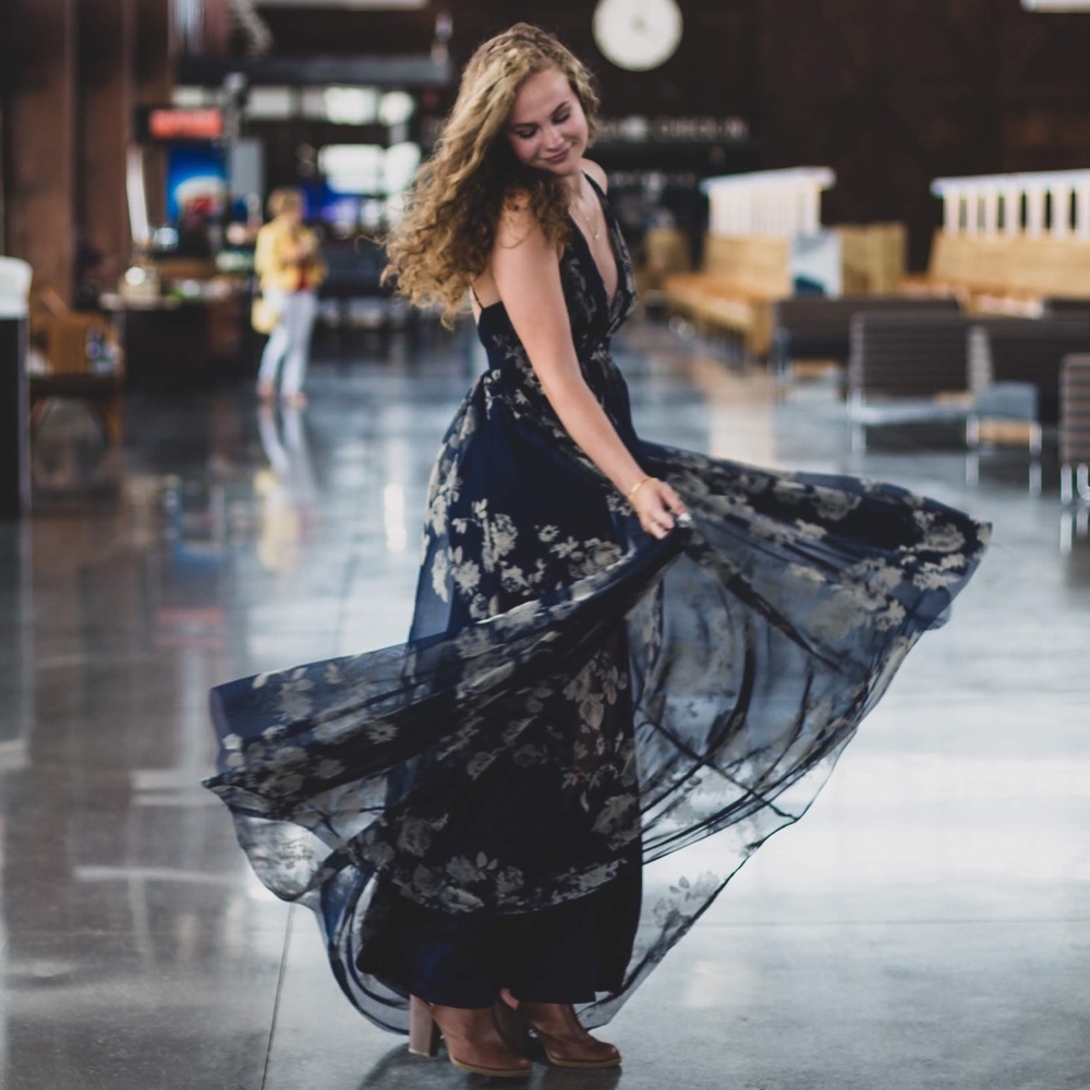 navy dress with cream flowers